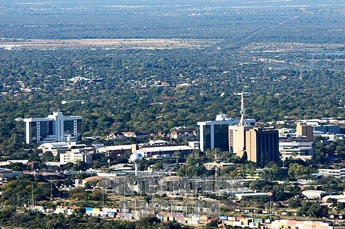 Gaborone city as seen from the top of Kgale Hill zoomed in on the Government enclave with its two enormous distinct identical office buildings